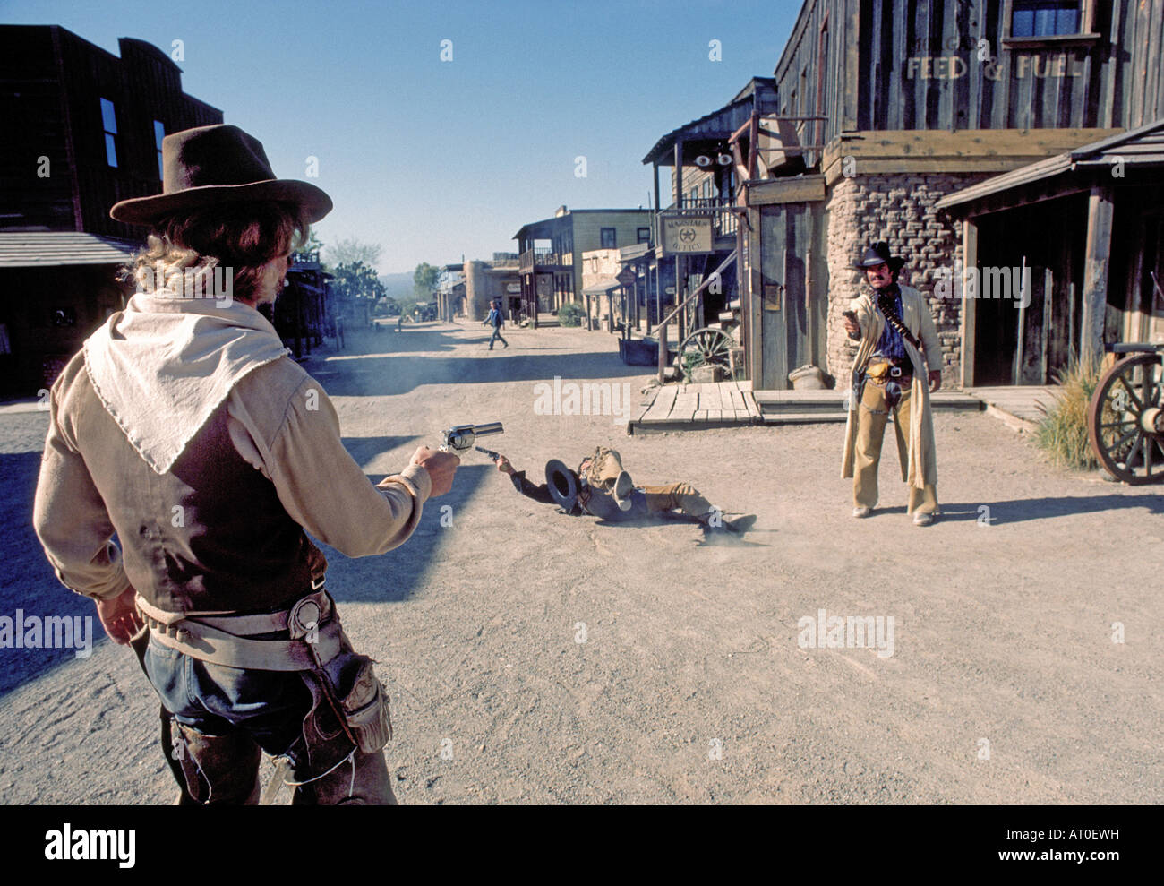 A mock gunfight in the streets of Old Tucson Studios and movie set in Tucson Arizona in the sonoran desert Stock Photo