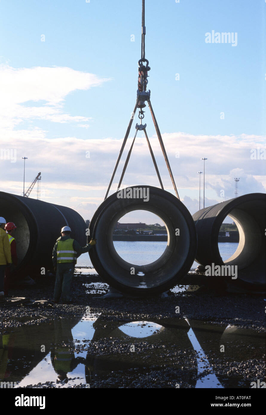 Preparing to Lift a Concrete Pipe Stock Photo Alamy