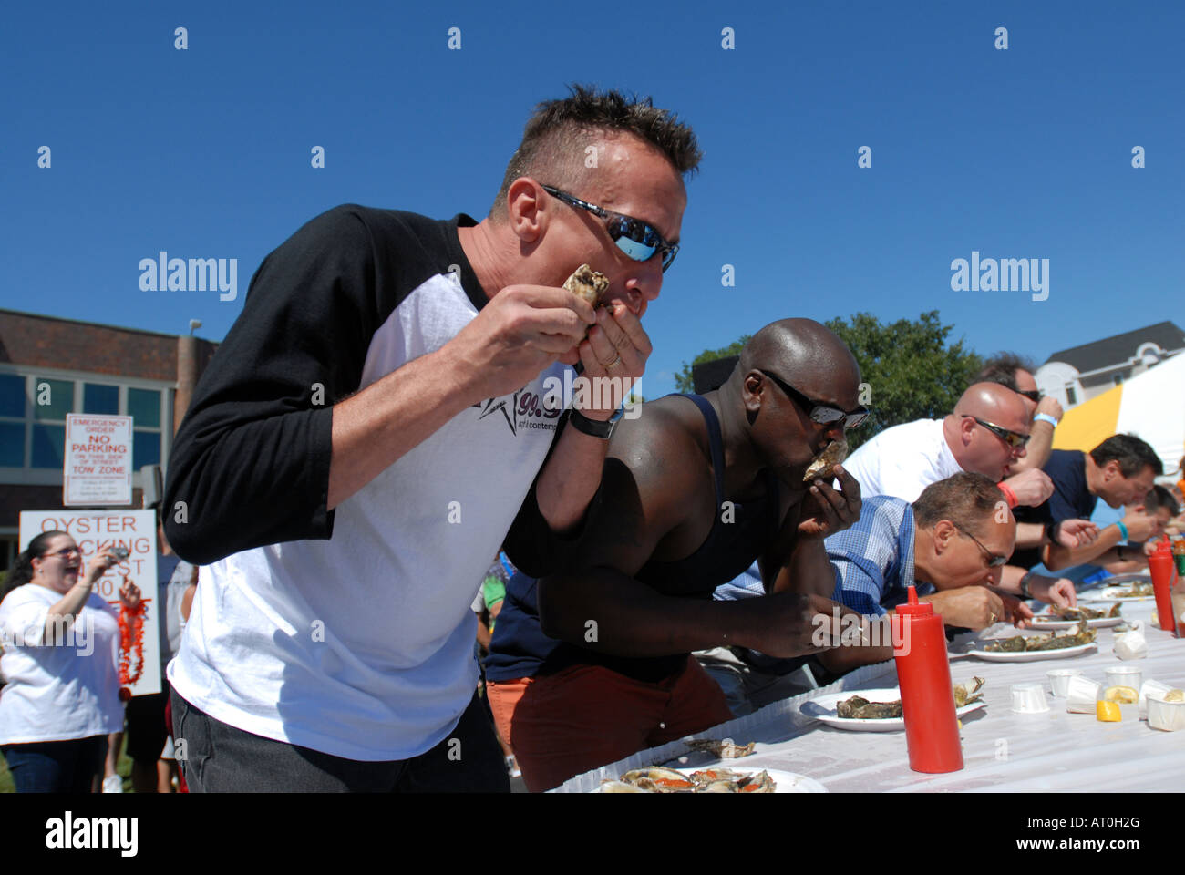 People eat Raw Oysters during an eating contest at the Milford Oyster