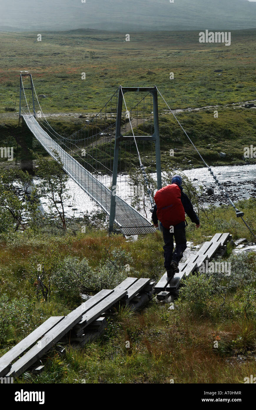 Hiker Crossing Narrow Bridge High Resolution Stock Photography and ...
