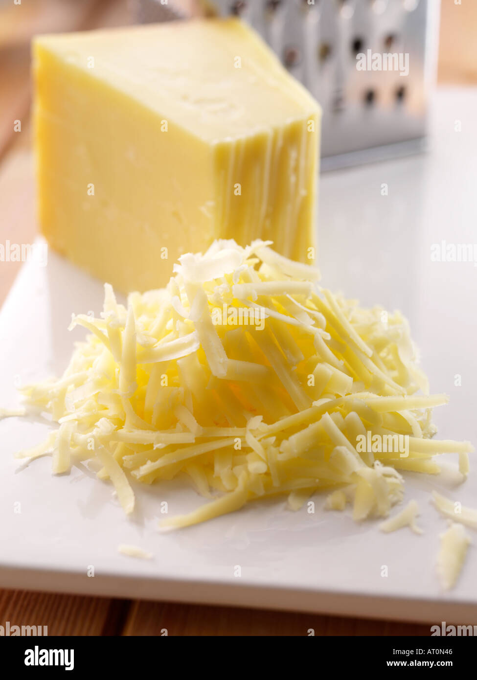 Grated cheddar cheese Stock Photo Alamy