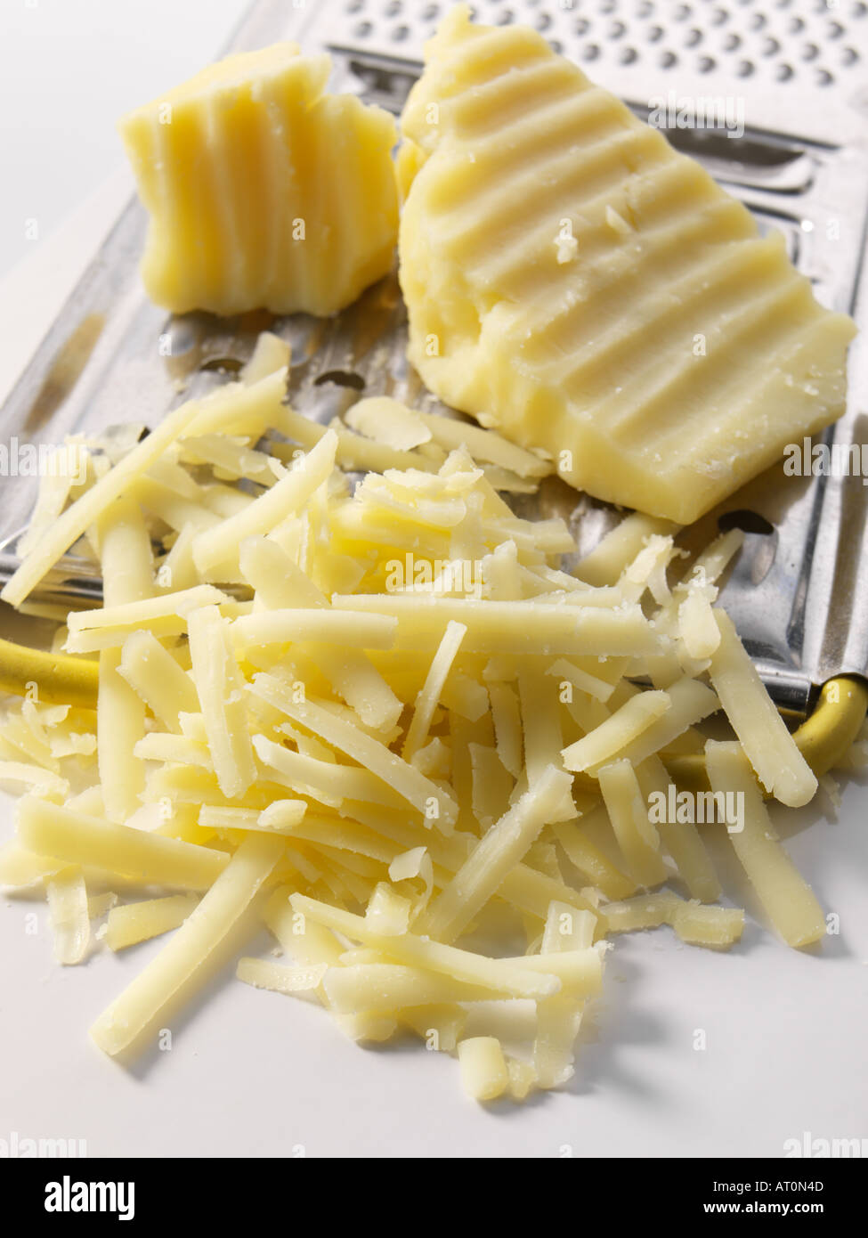 Grated Cheddar cheese Stock Photo Alamy