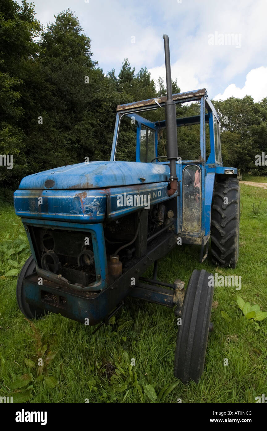 Rusty blue tractor Stock Photo