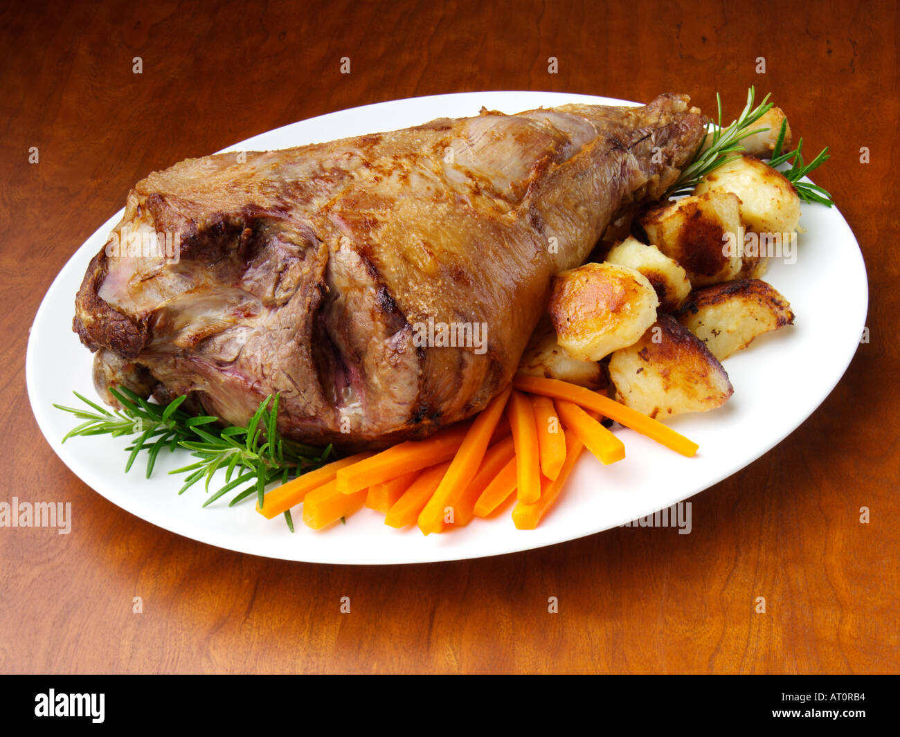 Roast leg of lamb Stock Photo Alamy