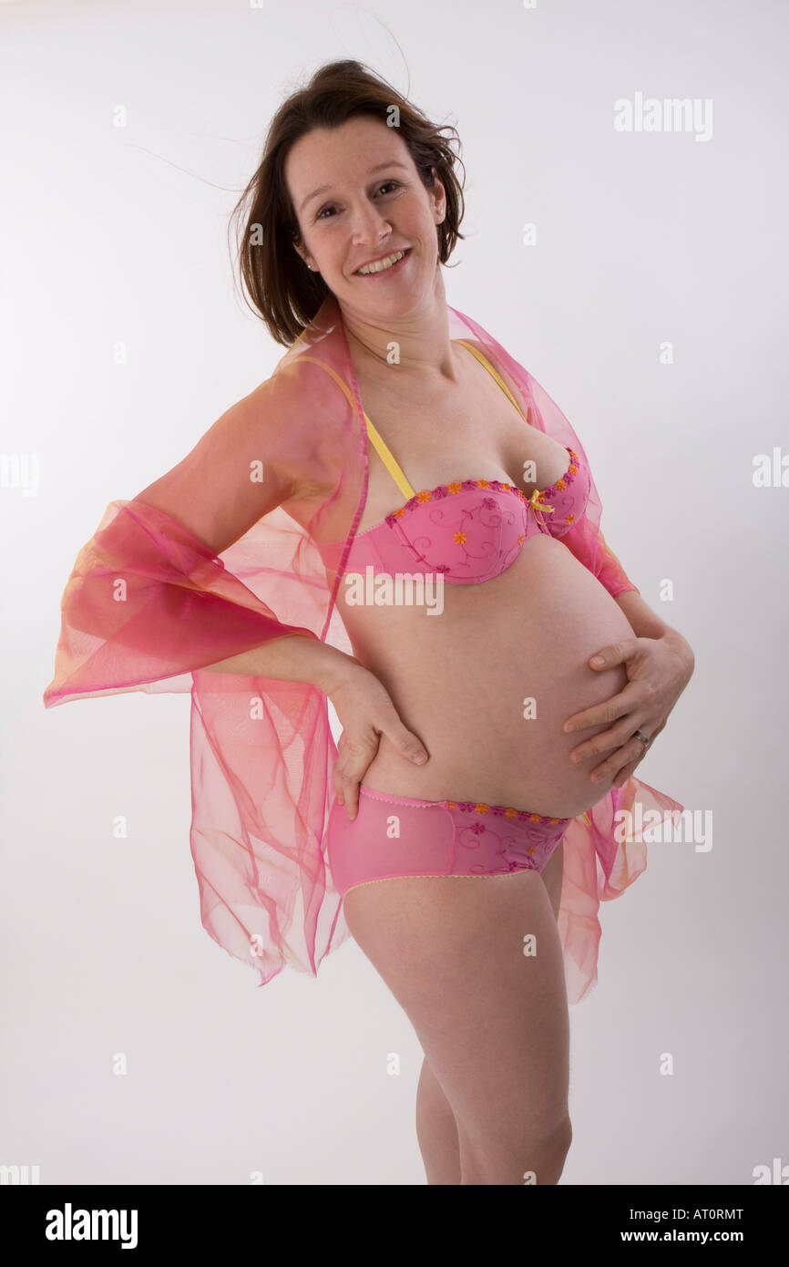pregnant woman in underwear Stock Photo - Alamy
