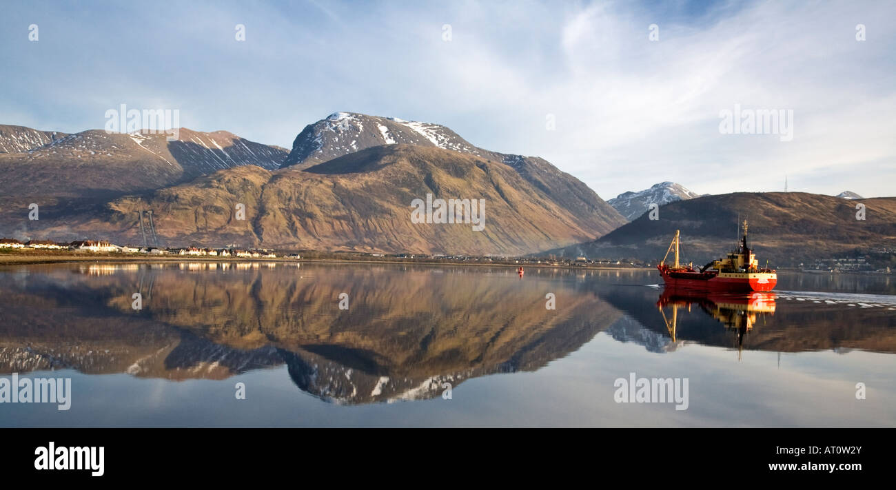 Ben Nevis and Loch Linnhe with a mirror like reflection of the mountain in the water, Lochaber, Scotland. Stock Photo