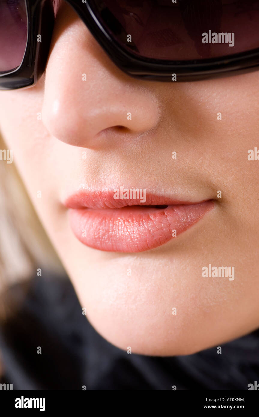 Close up of beautiful woman wearing sunglasses Stock Photo - Alamy