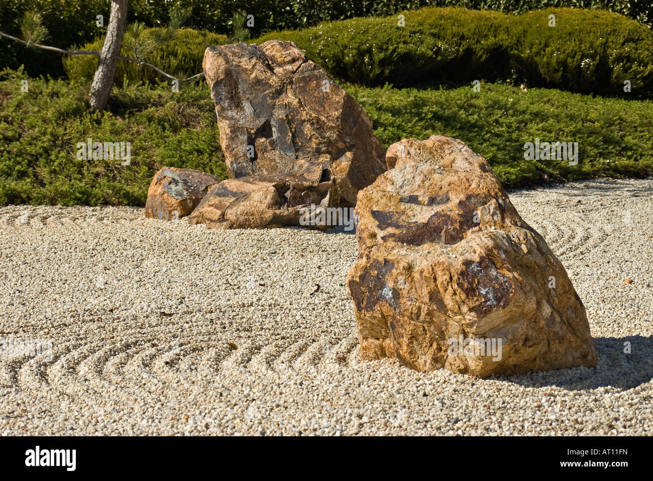 japanese rock garden showing raked gravel stones Stock Photo Alamy