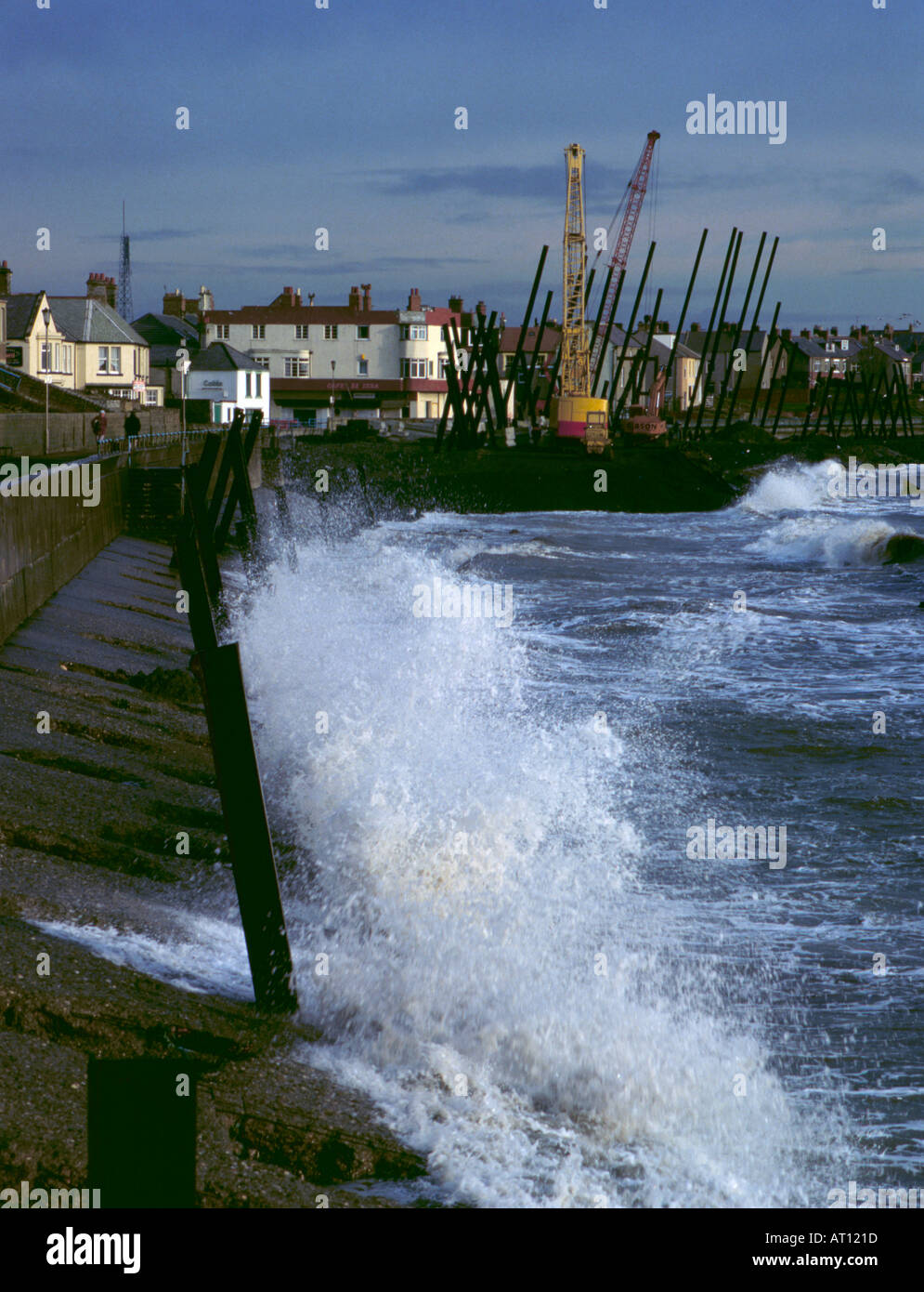 Coastal defence; construction of a new reinforced concrete wave wall at Newbiggin-by-the-Sea, Northumberland, England, UK., 1989. Stock Photo