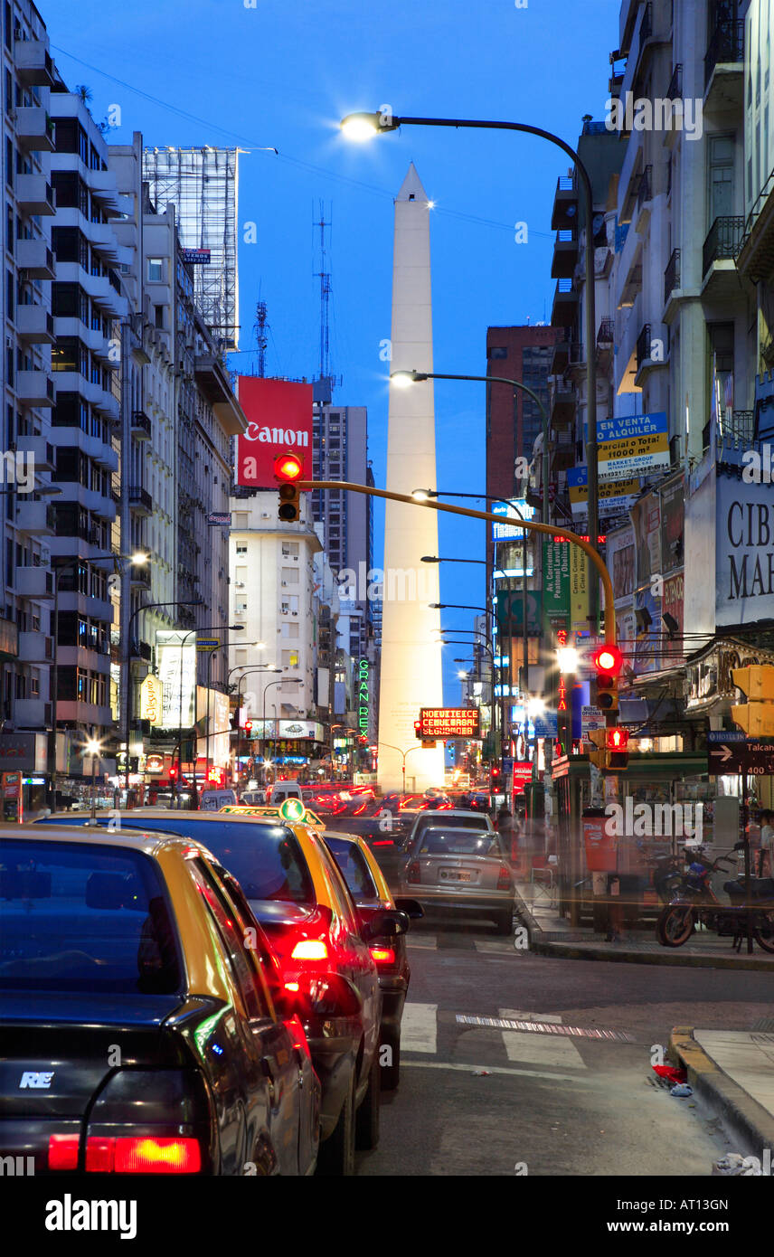 Corrientes Avenue, with Obelisco Monument and taxi vehicles, at night