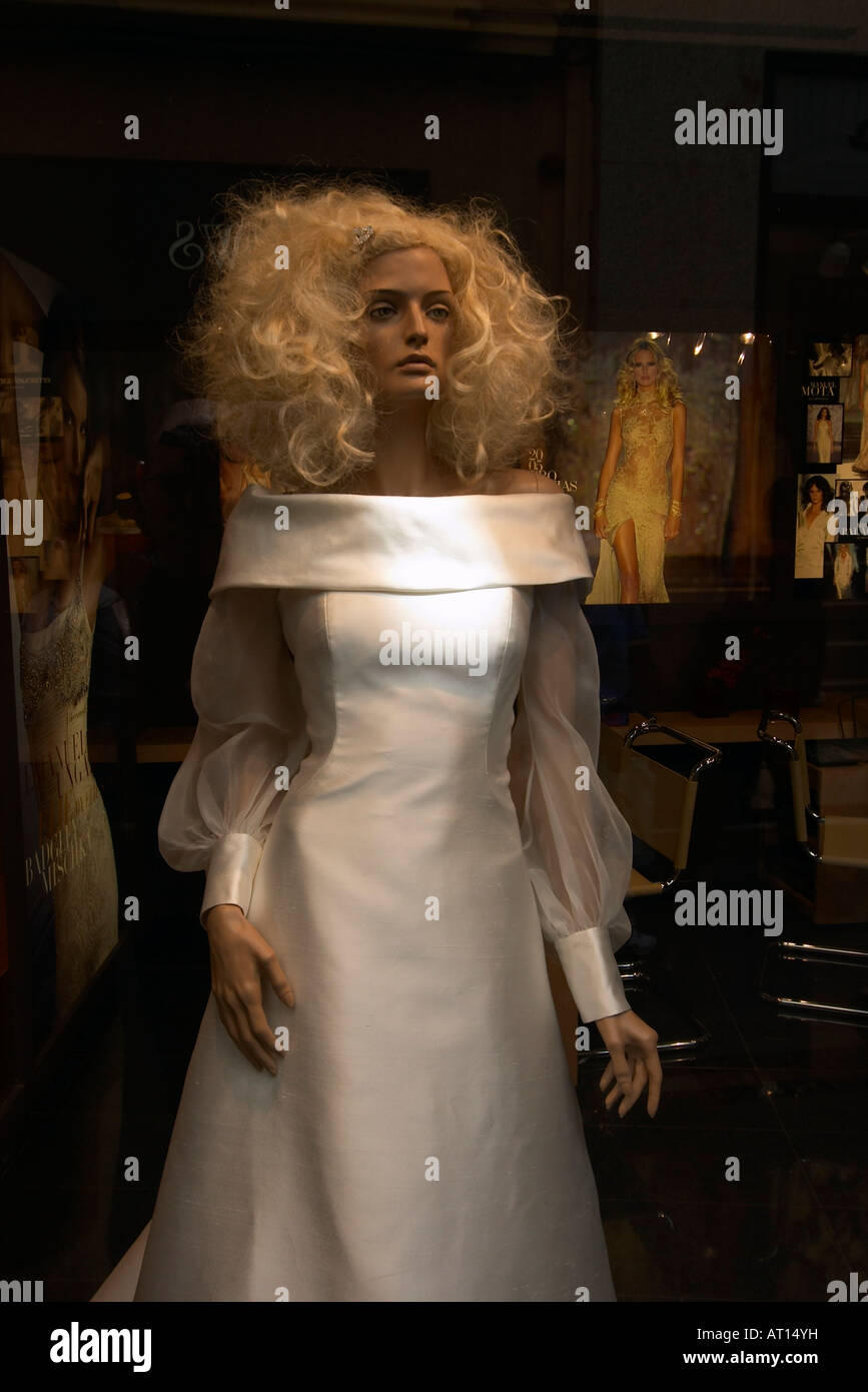 Display dummy in a boutique with white dress Stock Photo Alamy