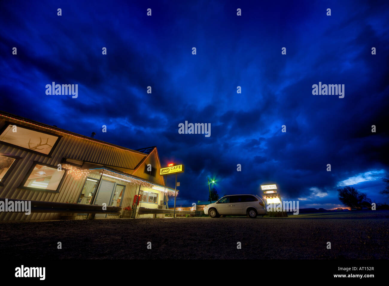 Motel and Restaurant Largo, Quemado, New Mexico at dusk. Open sign