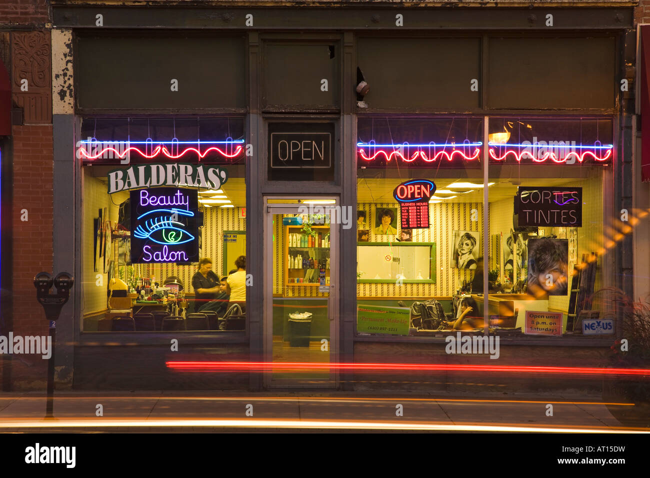 ILLINOIS Aurora Exterior of beauty salon at night neon sign customer