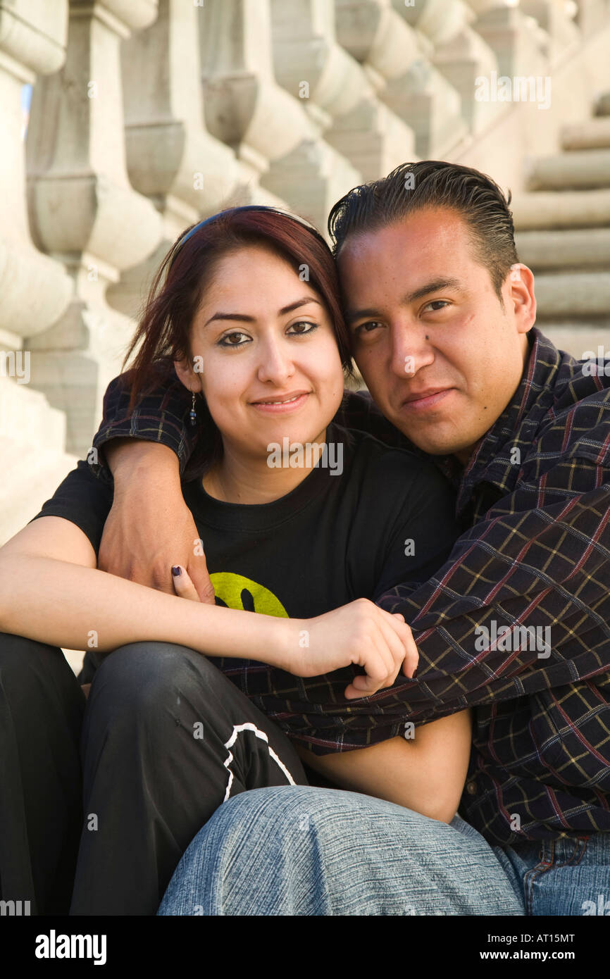 MEXICO Guanajuato Young man and woman sitting close together on steps ...