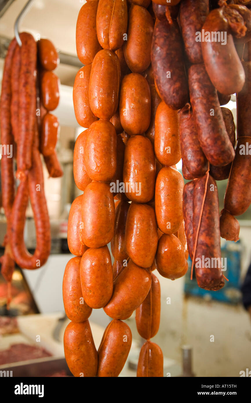 MEXICO Guanajuato Sausages hanging on display butcher shop in Mercado