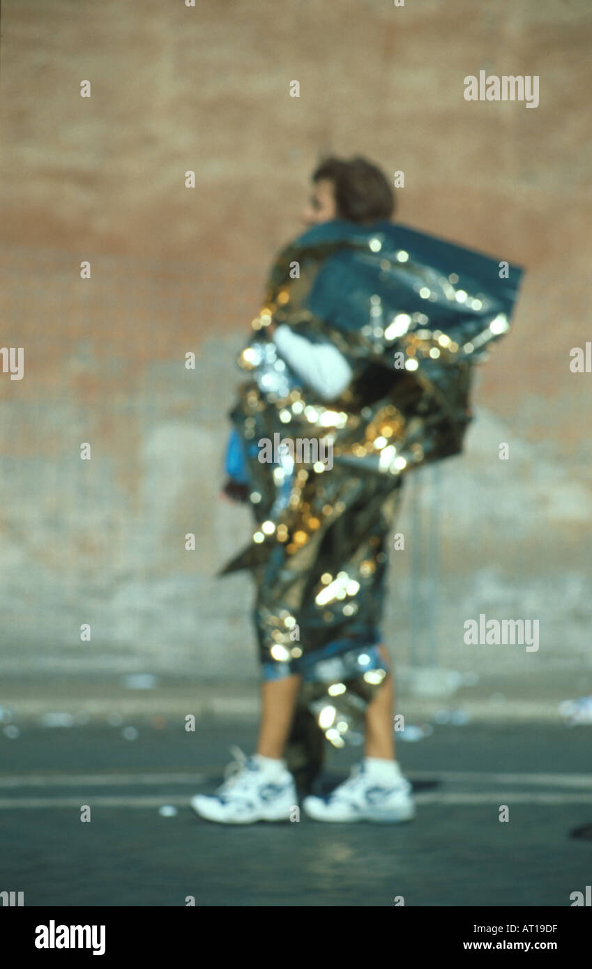 marathon runner with after race foil cover Stock Photo Alamy