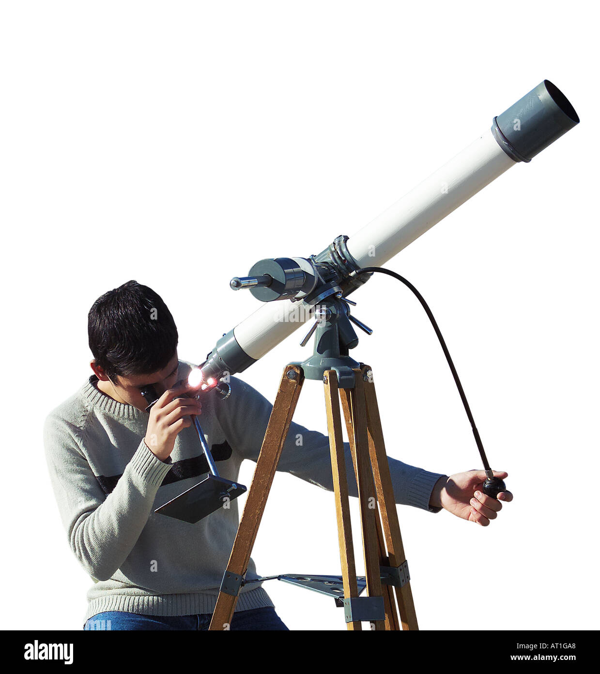 Teenage boy watching the skies with telescope Stock Photo