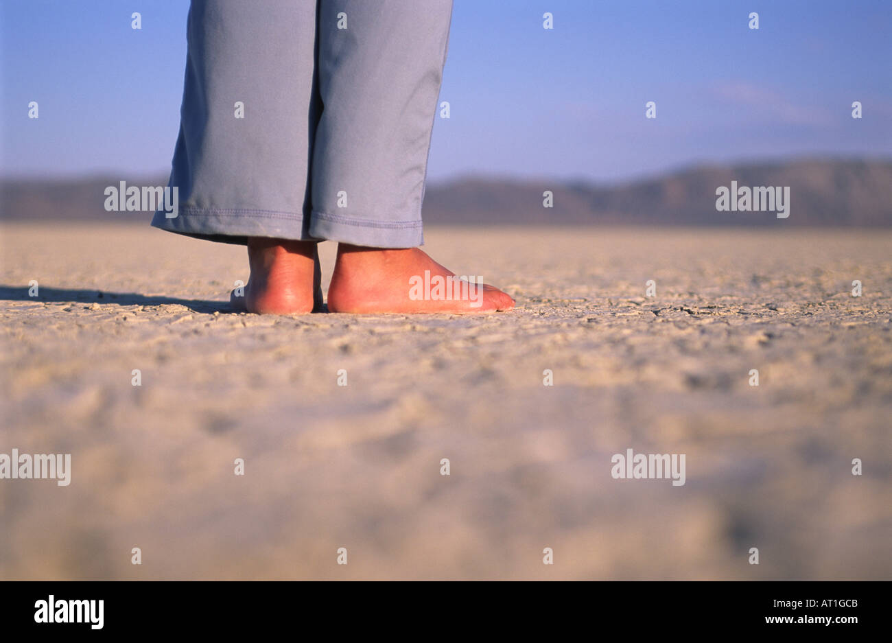 Woman standing on the Black Rock Desert playa Nevada USA Stock Photo ...
