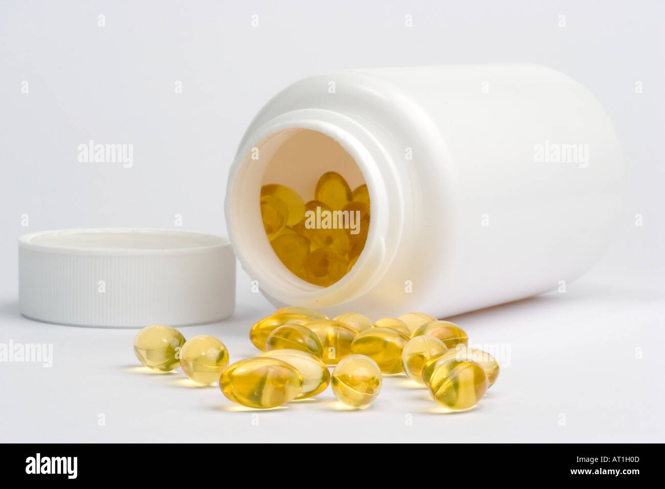 cod liver oil tablets golden many Stock Photo Alamy