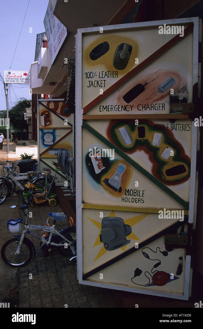 Shop front art Serrekunda The Gambia West Africa. Advertising the retail sector that the shop belongs to. Stock Photo