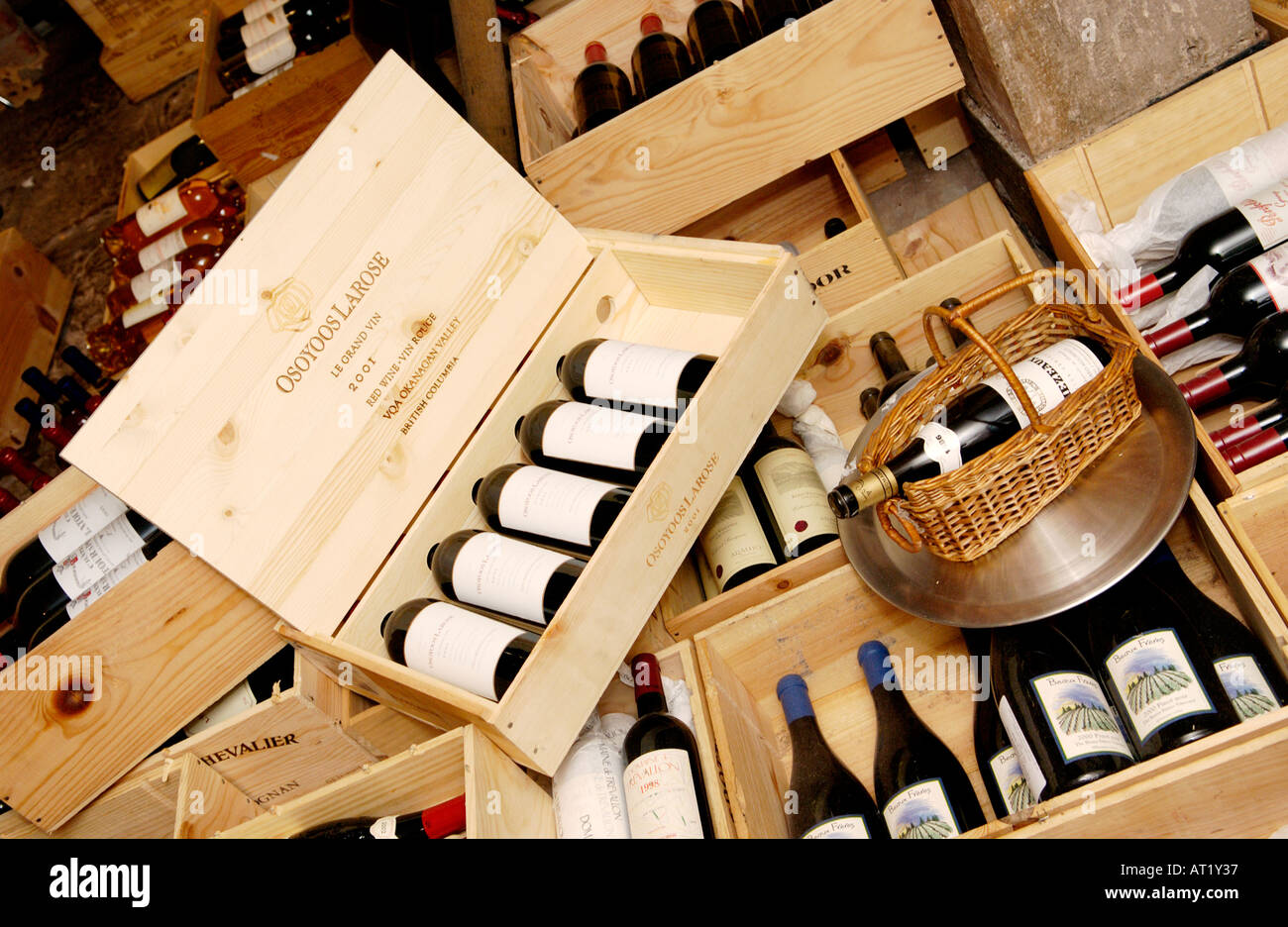 Wooden boxes of expensive red wine in the cellar of Hotel du Vin Bristol England UK Stock Photo