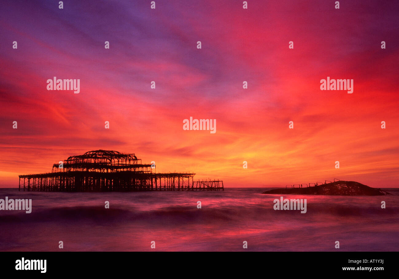 Dramatic sunset over Brighton's West Pier Stock Photo