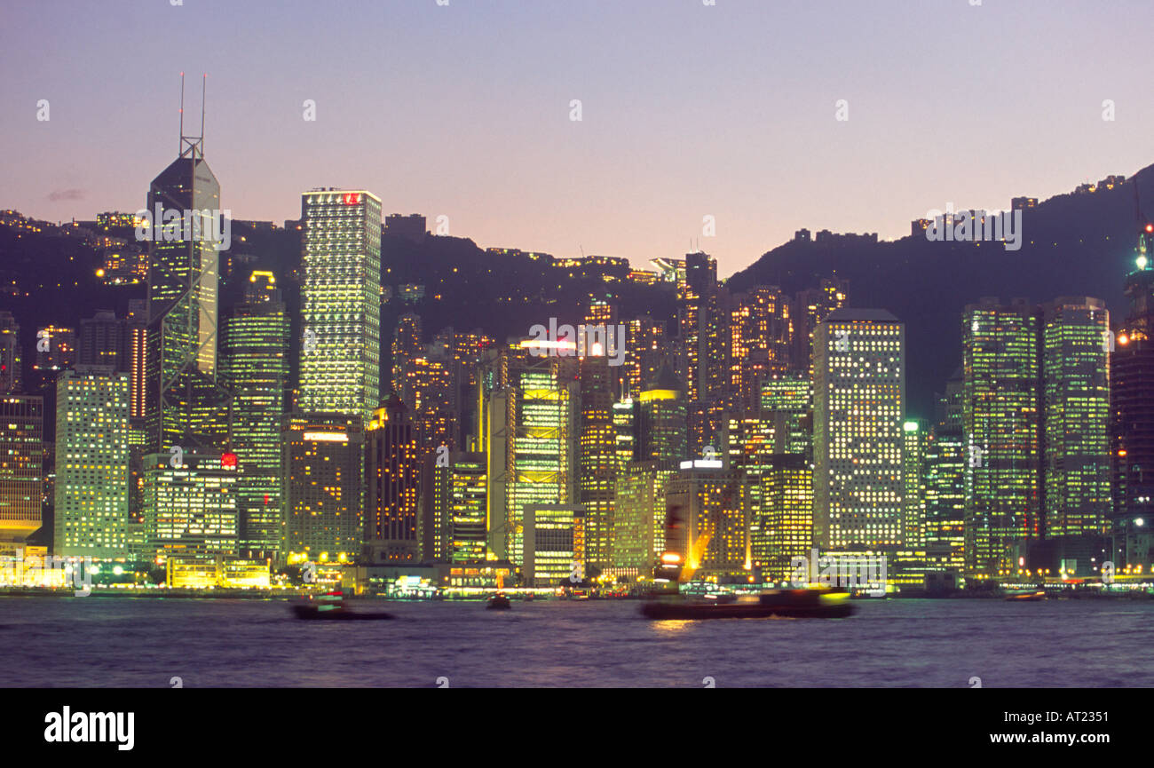 The Hong Kong Island skyline at dusk seen from Kowloon Hong Kong Stock ...