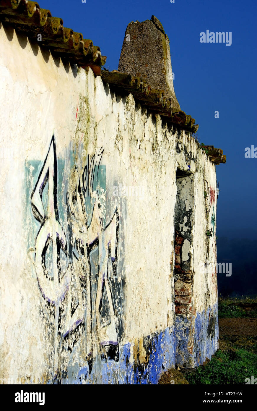 Old house with graffitti. Stock Photo