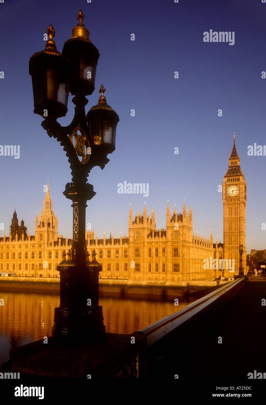 Ornate lamps on Westminster Bridge with Houses of Parliament behind