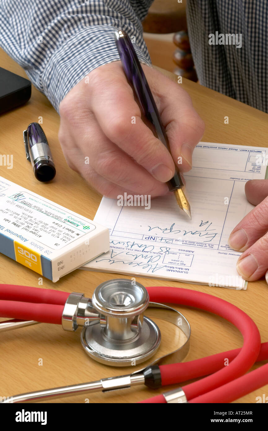 doctor filling out prescription form with pen stethoscope foreground