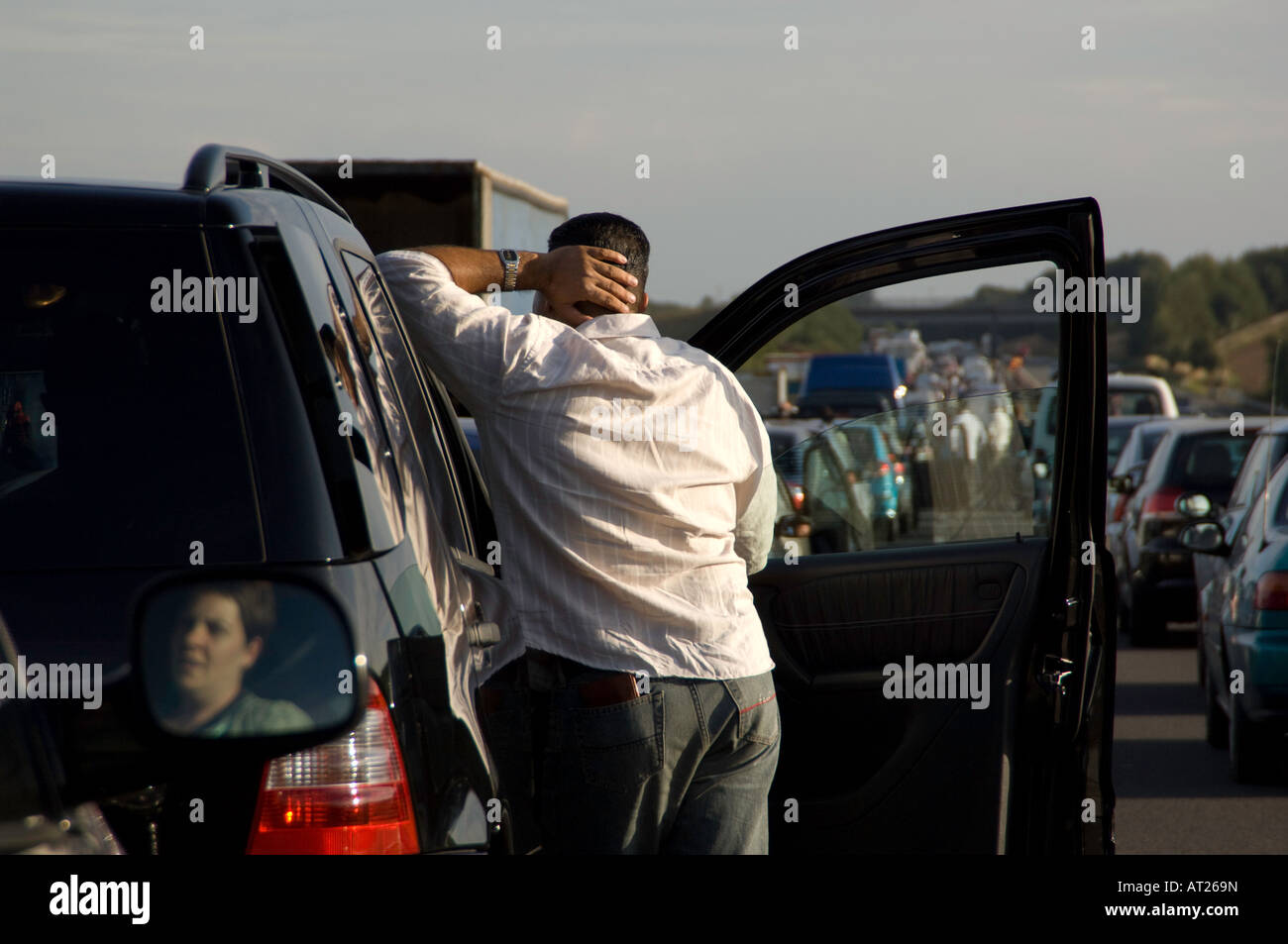People wait for a traffic jam to clear after an accident on the M$ Oxfordshire. Stock Photo