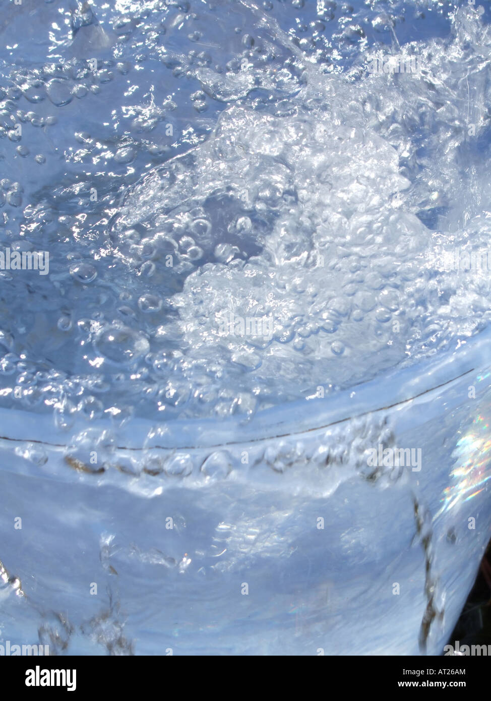 bucket full of water Stock Photo - Alamy