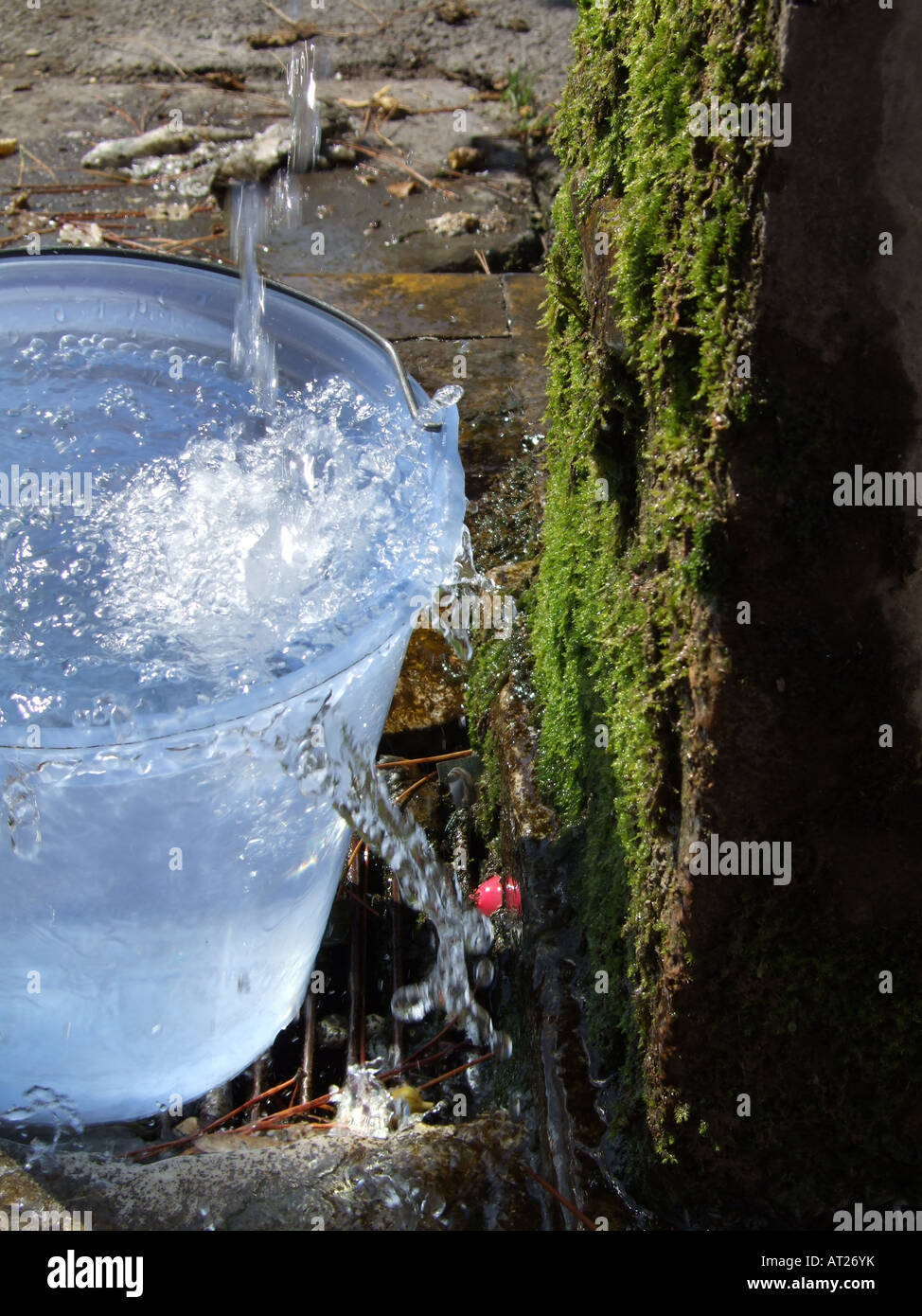 bucket full of water Stock Photo - Alamy