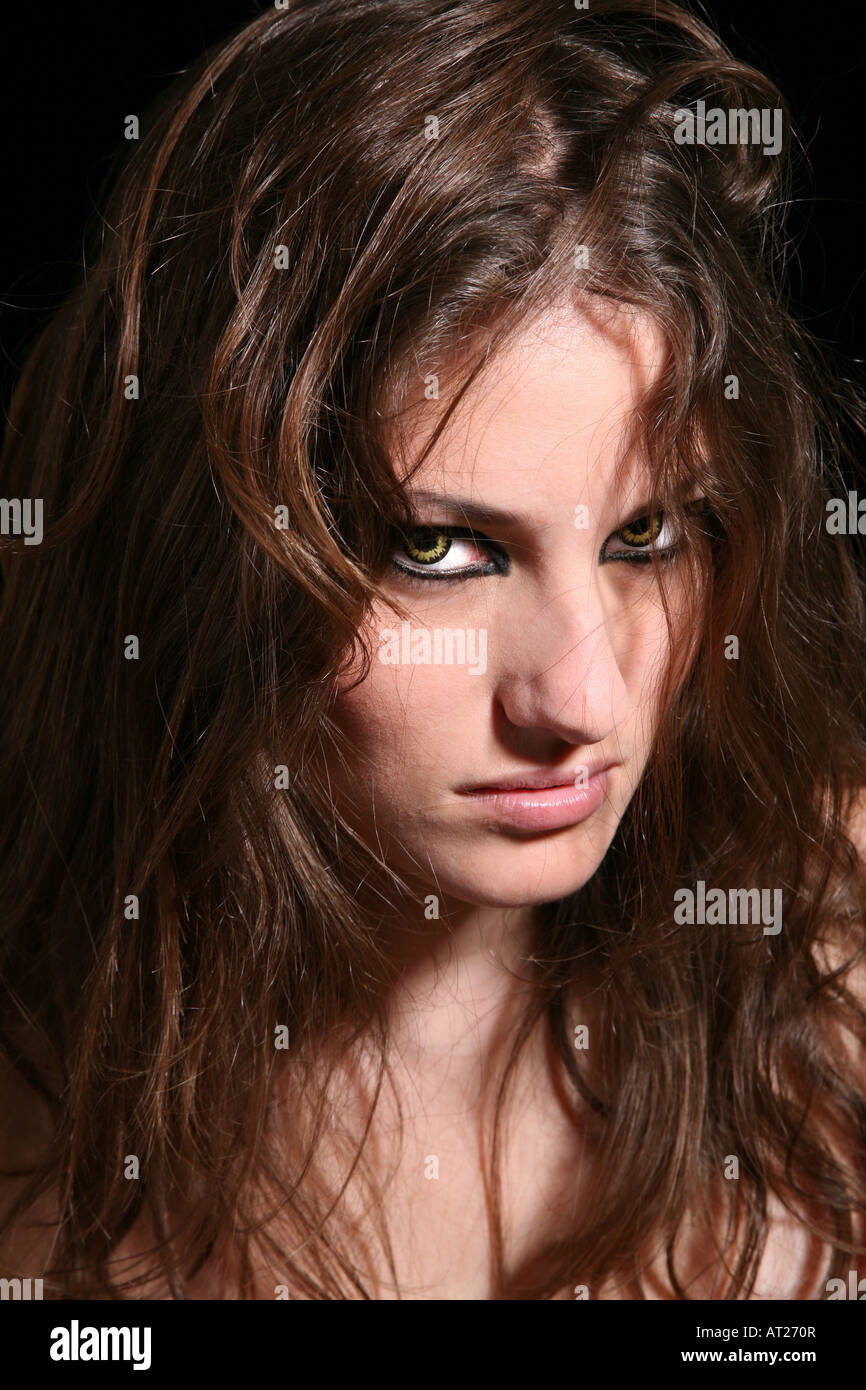 Beautiful caricature of gothic girl screaming with fancy makeup, wolf  lenses and big fangs Stock Photo - Alamy