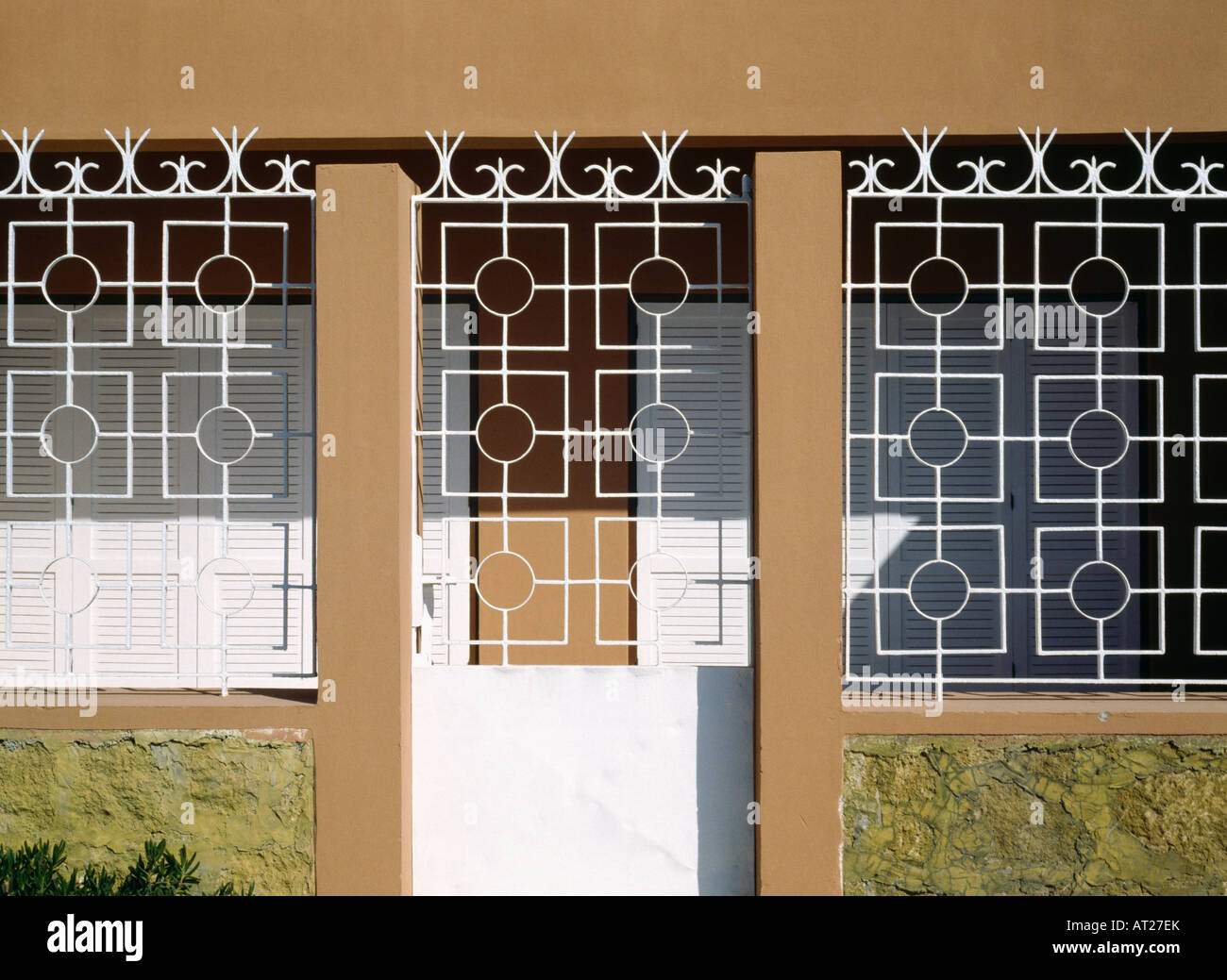 White metal security grilles on door and windows of Turkish house Stock Photo