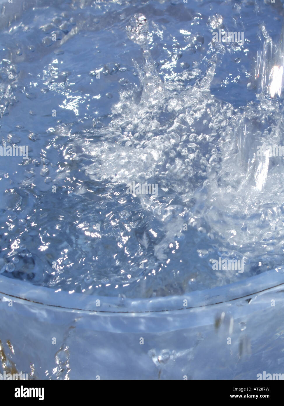 bucket full of water Stock Photo - Alamy