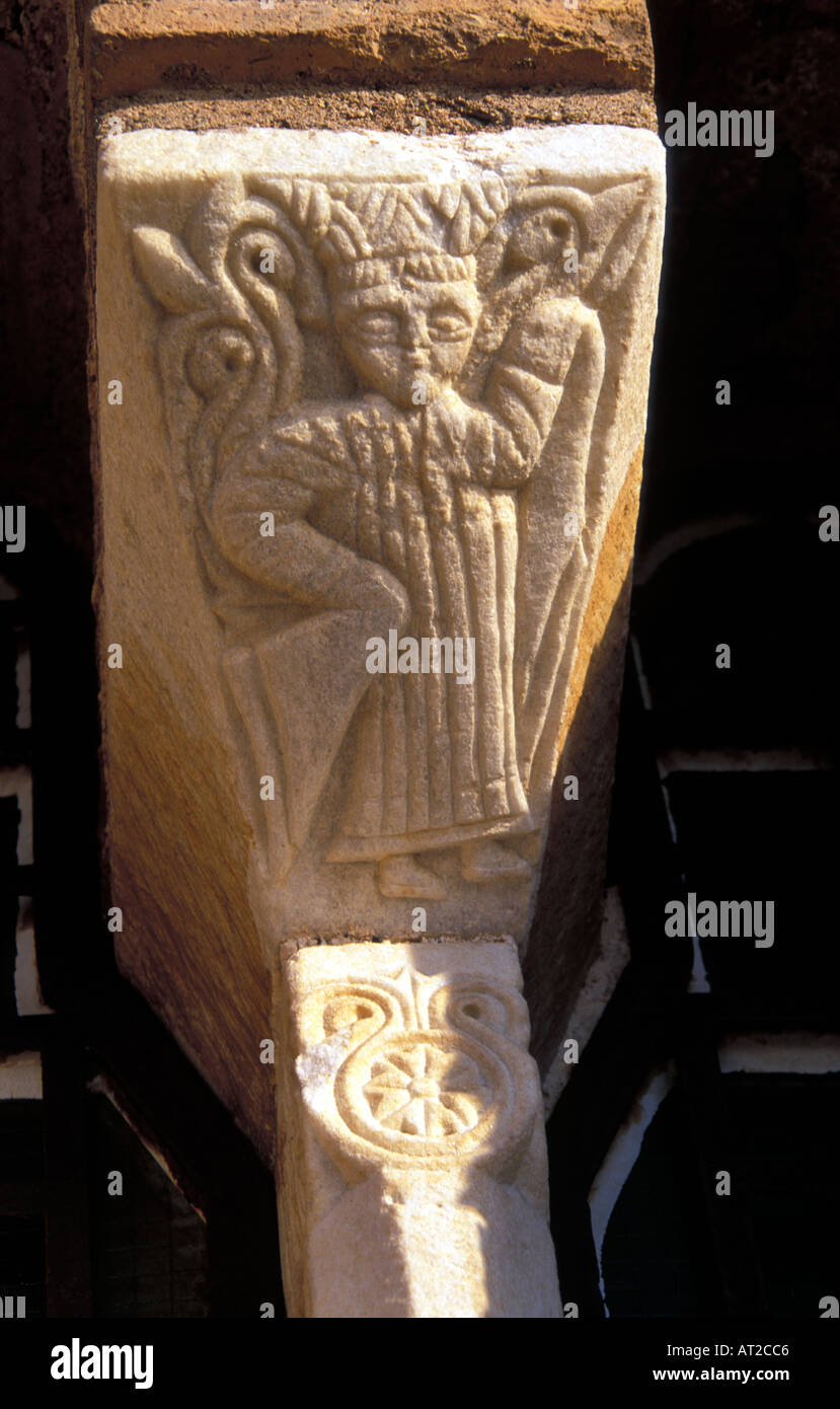 Carving on a corbel depicting an ecclesiastical figure. Stock Photo