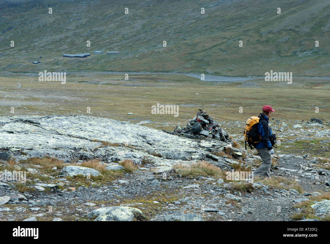 A female hiker on the way downwards near the Sylaran Mountain Station Jamtland August 2007 Stock Photo