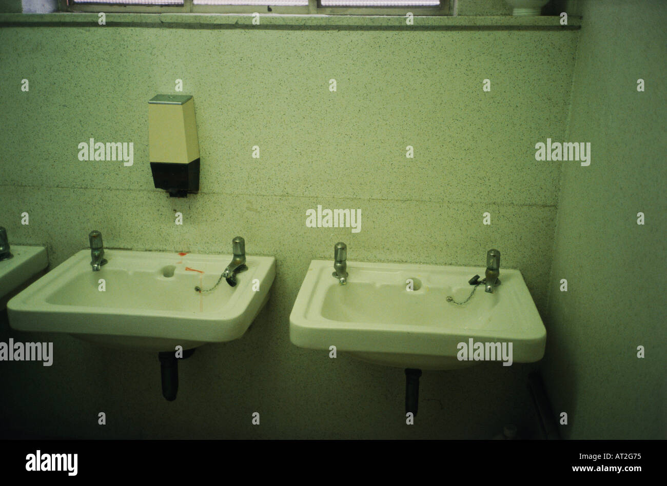 Sinks in a public toilet Stock Photo Alamy