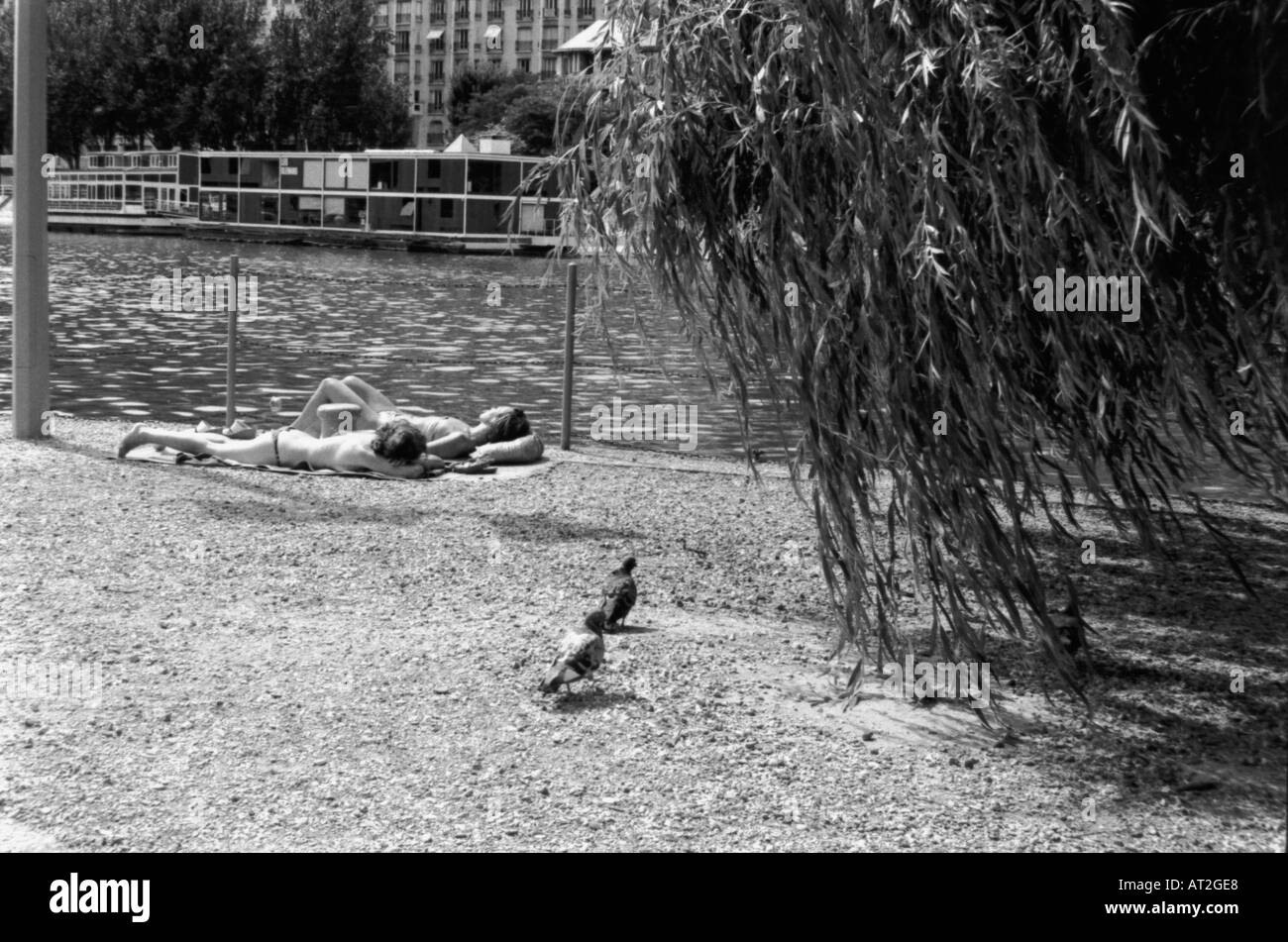 Sunbathing on bank of river Black and White Stock Photos & Images Alamy