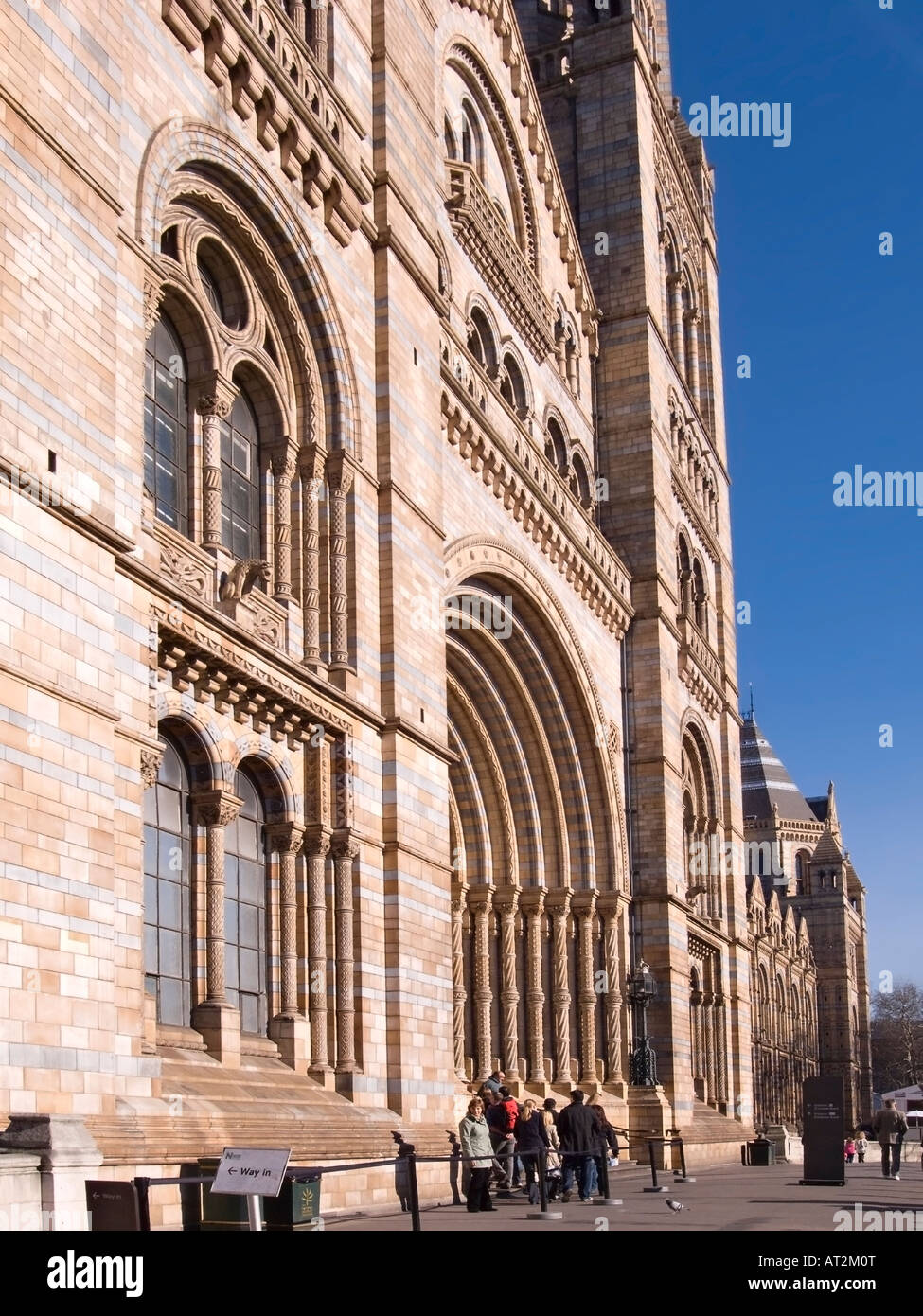 Queue of tourists outside the Natural History Museum, London waiting for admission Stock Photo