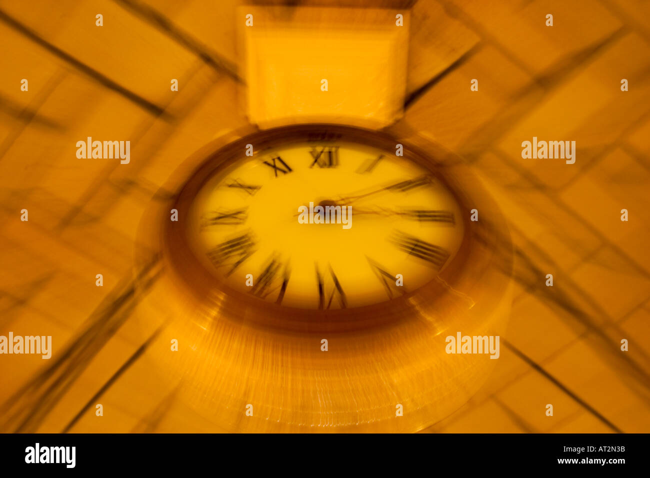 Clock hanging from the ceiling in an office building Stock Photo Alamy