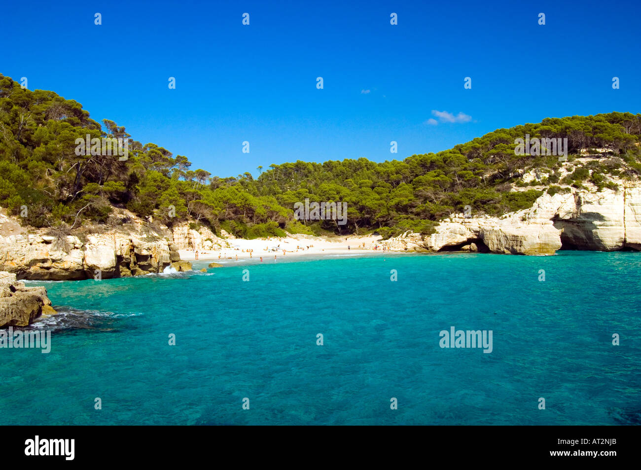 Cala Mitjana playa beach wooded cove Menorca Stock Photo - Alamy