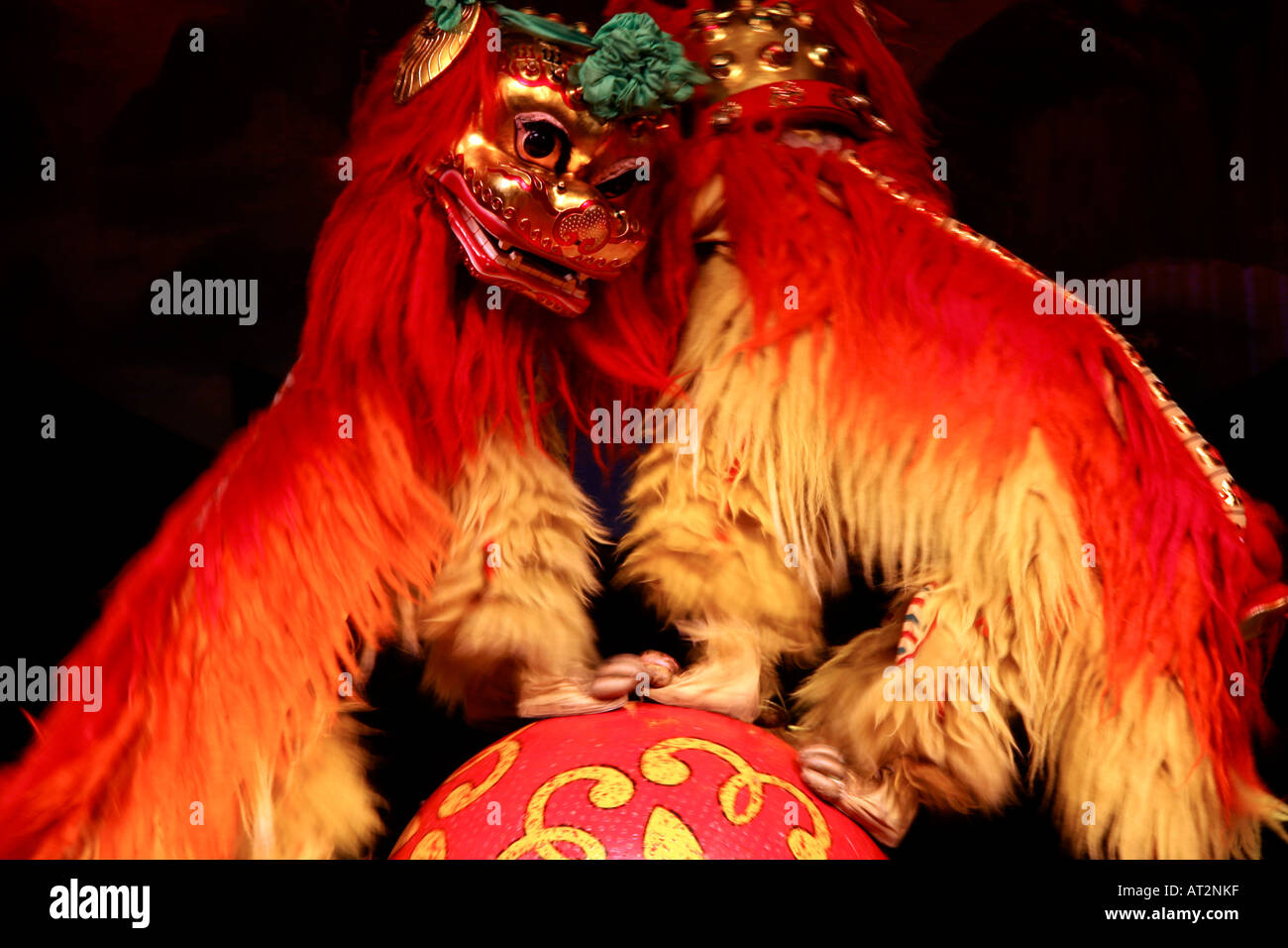 Traditional Chinese dragon dancers perform for the Acrobatic Circus at The Heaven and Earth Theatre, Beijing, China Stock Photo