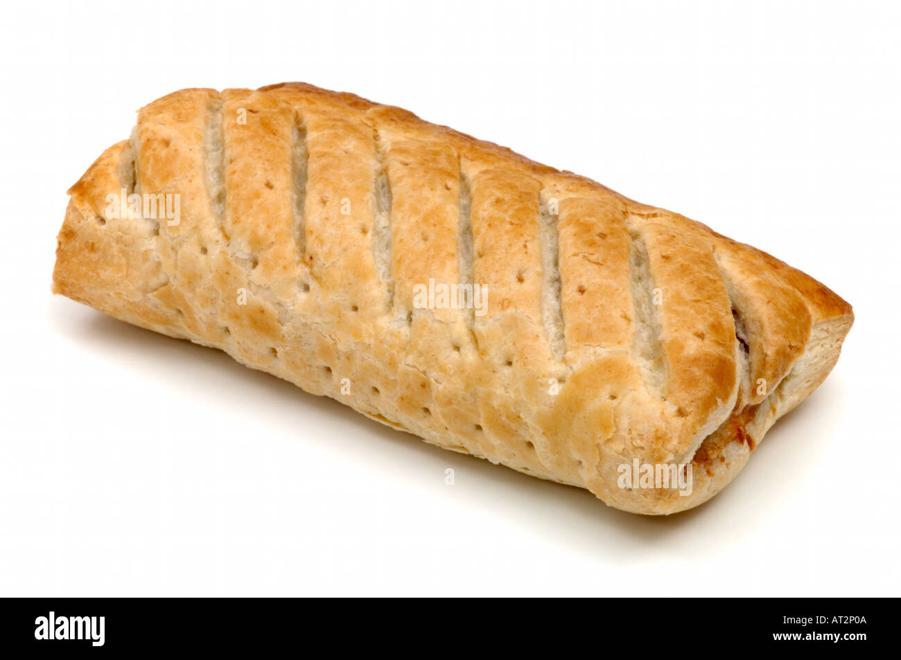 Single sausage roll, traditional english food on white background Stock ...