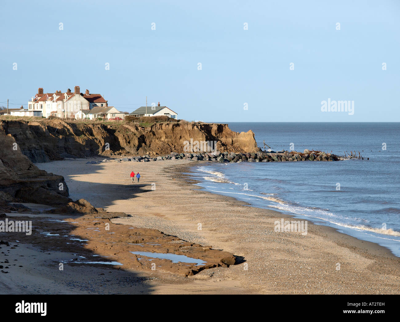 CLIFF TOP VIEW OF HAPPISBURGH BEACH AND ROCK ARMOUR SEA DEFENCES, NORFOLK ENGLAND UK Stock Photo