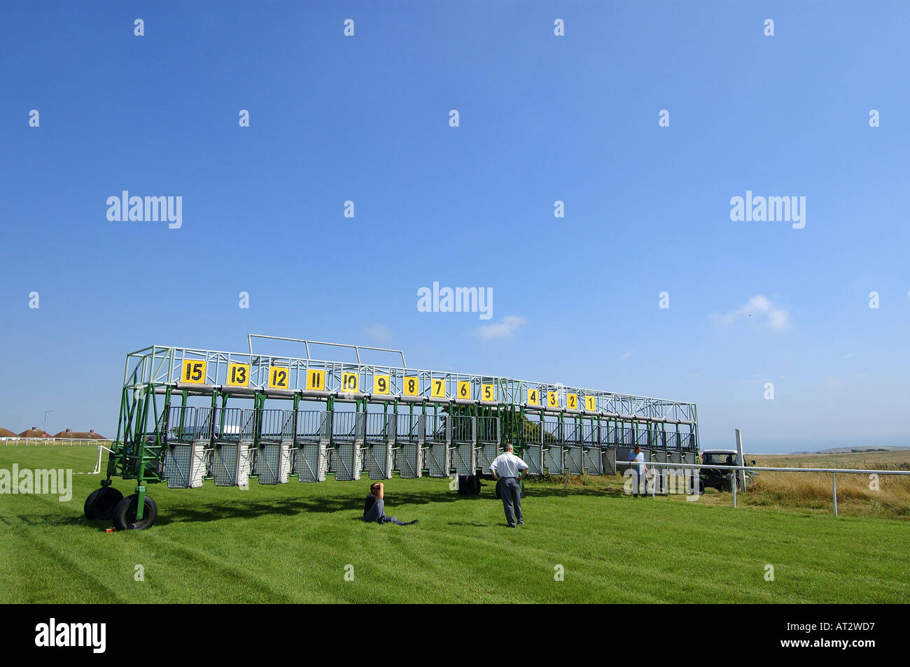 The starting stalls and stall handlers at Brighton races. Picture by Andrew Hasson, August 2nd 2005 Stock Photo