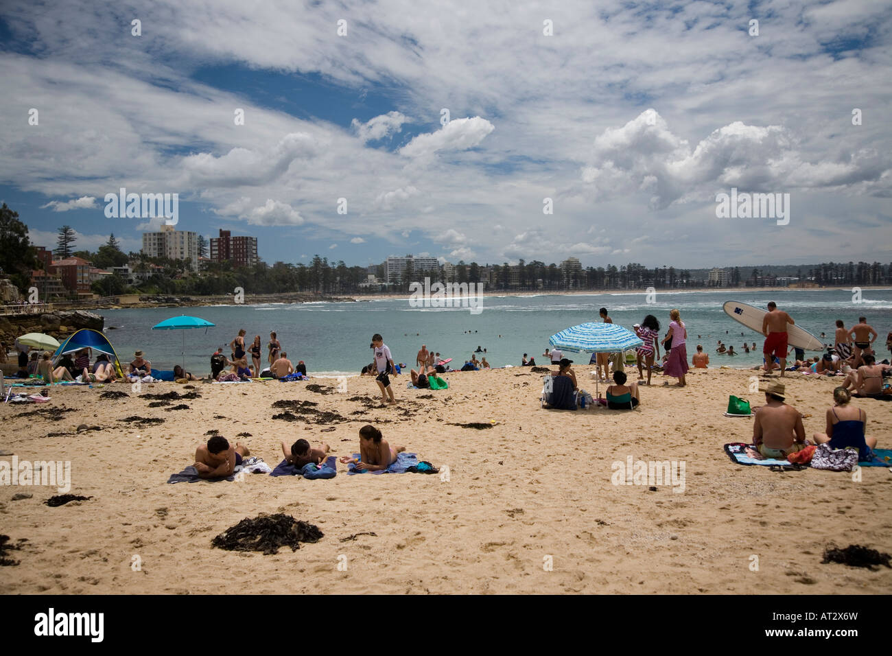 Cabbage Tree Bay Aquatic Reserve with people on the beach Stock Photo