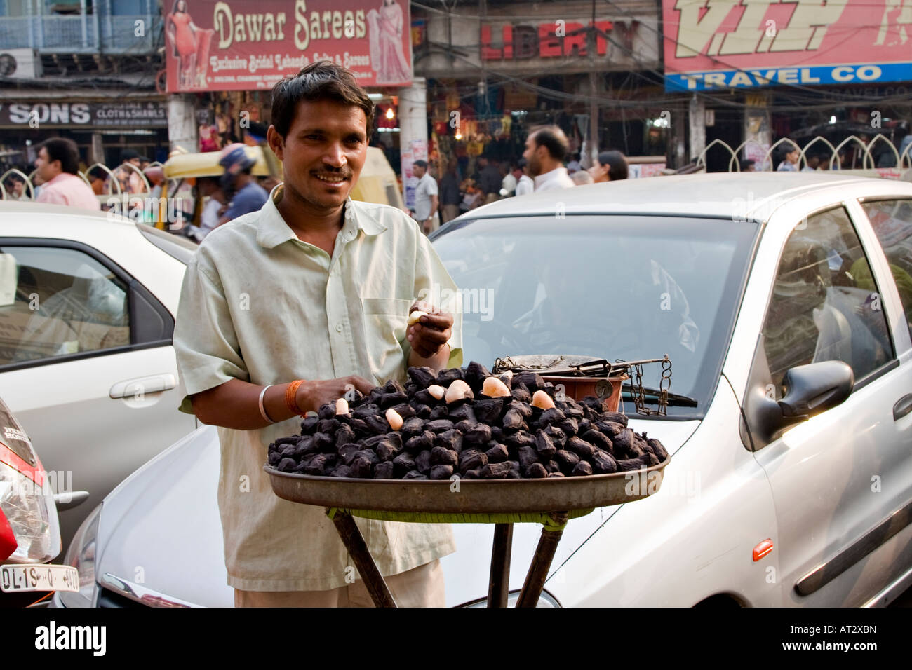 Indian man selling Singhara nut (trapa natans)(water chestnut), Old Delhi, India Stock Photo