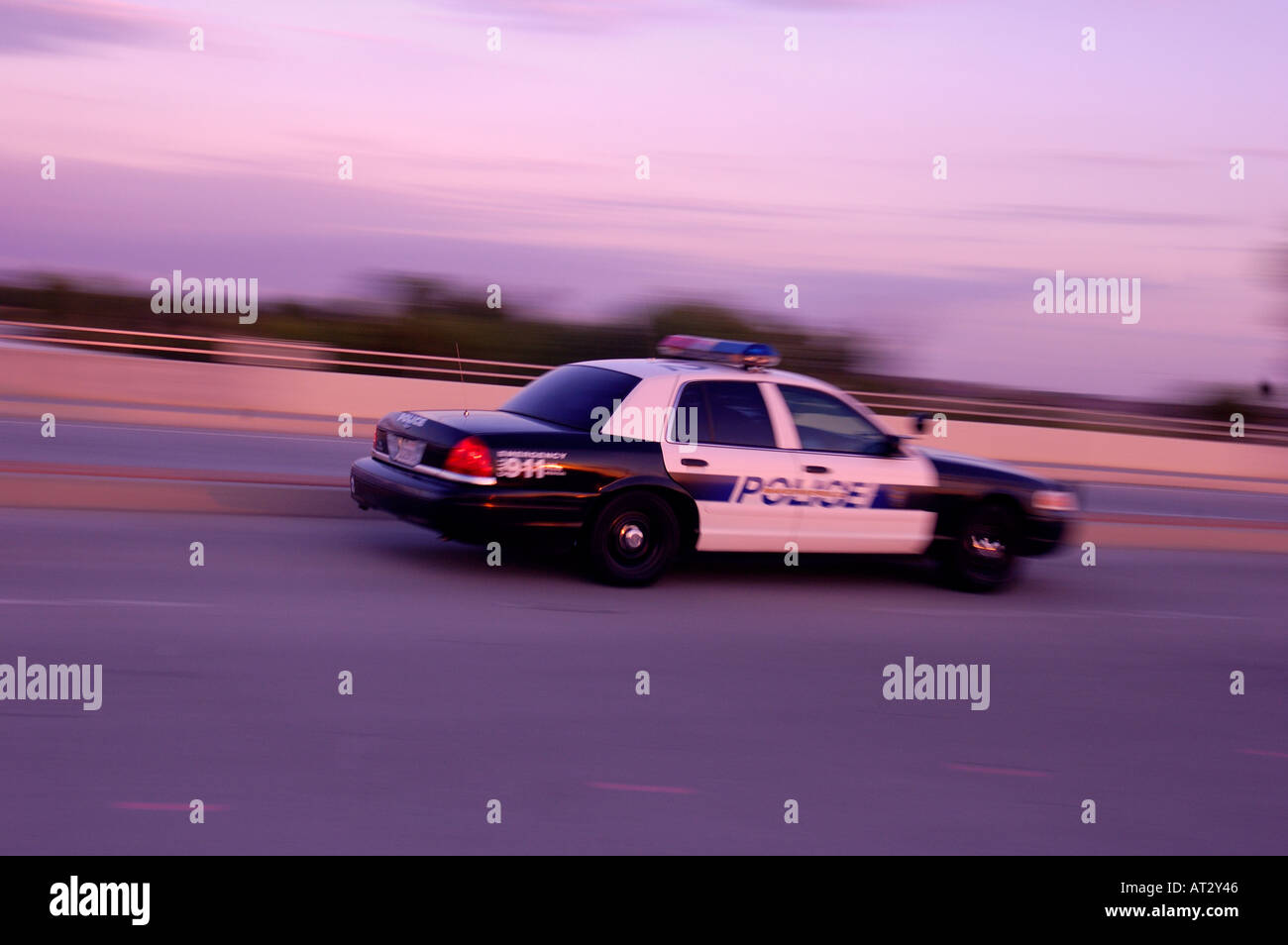 Law Enforcement Police Vehicle Moving Chasing Driving By Stock Photo